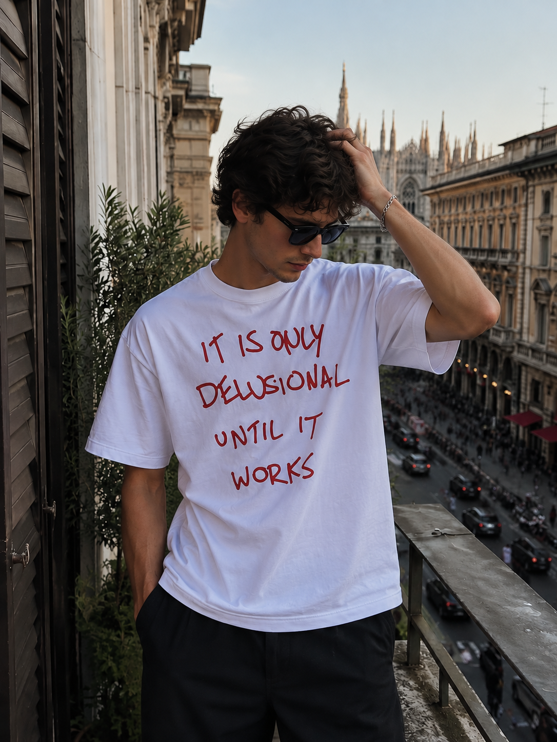 Delusional Until It Works Tee