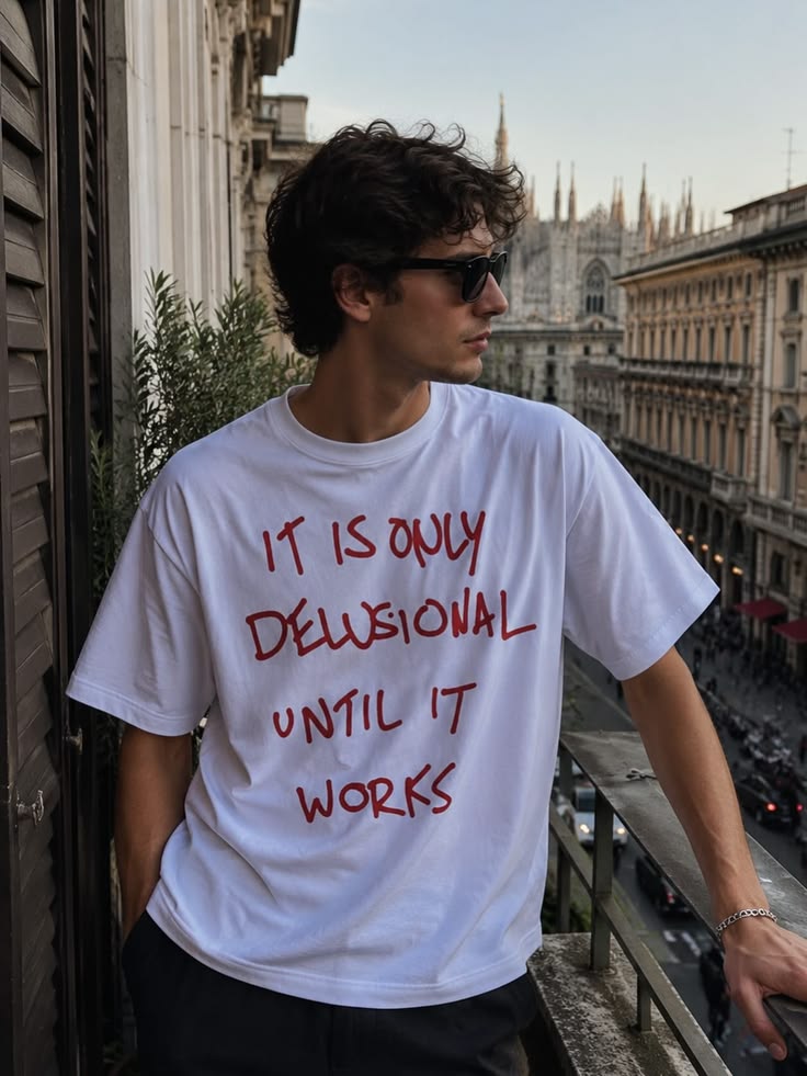 Delusional Until It Works Tee
